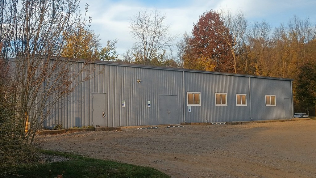 Ascension Event Center building with windows lit from inside